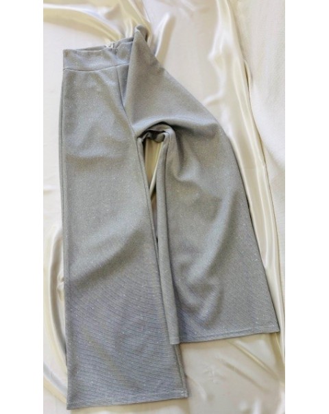 Παντελόνι καμπάνα με μεταλλικό νήμα στην πλέξη του