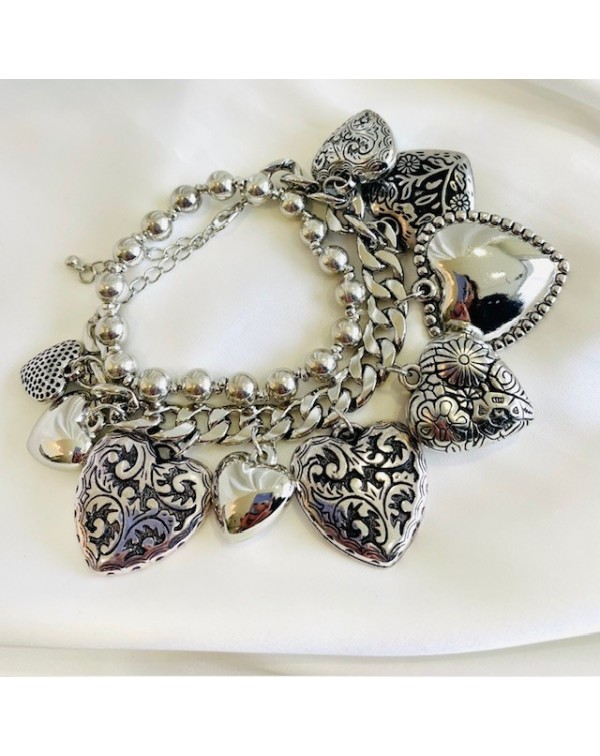 Set of bracelets with hanging hearts